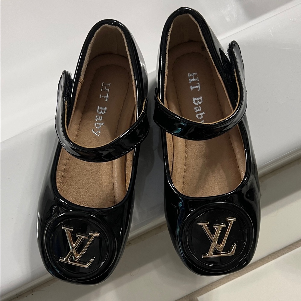 Little Girls' Black Patent Mary Janes with Gold Logo Accent